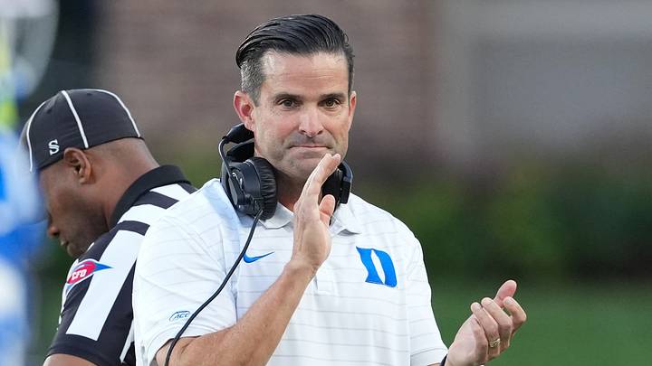 Aug 28, 2025; Durham, North Carolina, USA; Duke Blue Devils head coach Manny Diaz reacts during the warmups before the game against the Elon Phoenix at Wallace Wade Stadium. Mandatory Credit: James Guillory-Imagn Images Aug 28, 2025; Durham, North Carolina, USA; Duke Blue Devils head coach Manny Diaz reacts during the warmups before the game against the Elon Phoenix at Wallace Wade Stadium. Mandatory Credit: James Guillory-Imagn Images