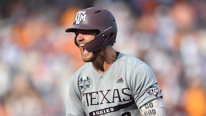 Texas A&M's Gavin Grahovac (9) celebrates an RBI-single during game three of the NCAA College World Series finals between Tennessee and Texas A&M at Charles Schwab Field in Omaha, Neb., on Monday, June 24, 2024.