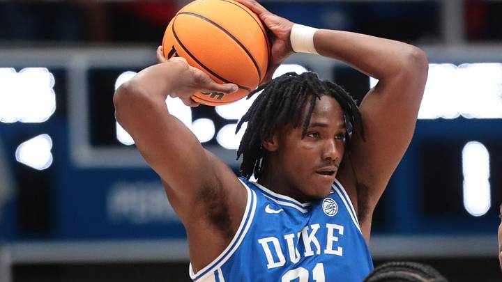 Duke Blue Devils center Patrick Ngongba II (21) looks for a pass against Kansas Jayhawks during the exhibition game inside Allen Fieldhouse in Lawrence, Kansas on Oct. 25, 2026. Duke Blue Devils center Patrick Ngongba II (21) looks for a pass against Kansas Jayhawks during the exhibition game inside Allen Fieldhouse in Lawrence, Kansas on Oct. 25, 2026.