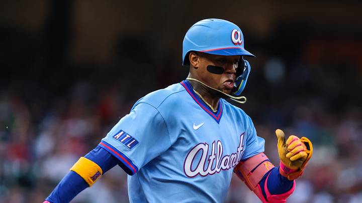 Sep 12, 2026; Cumberland, Georgia, USA;  Atlanta Braves right fielder Ronald Acuna Jr. (13) runs to first base for a single against Philadelphia Phillies third baseman Alec Bohm (28) during the first inning at Truist Park.  Mandatory Credit: Jordan Godfree-Imagn Images