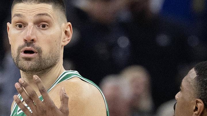 Feb 19, 2026; San Francisco, California, USA; Boston Celtics center Nikola Vucevic (4) looks to pass around Golden State Warriors guard De'Anthony Melton (8) during the first quarter at Chase Center. Mandatory Credit: D. Ross Cameron-Imagn Images