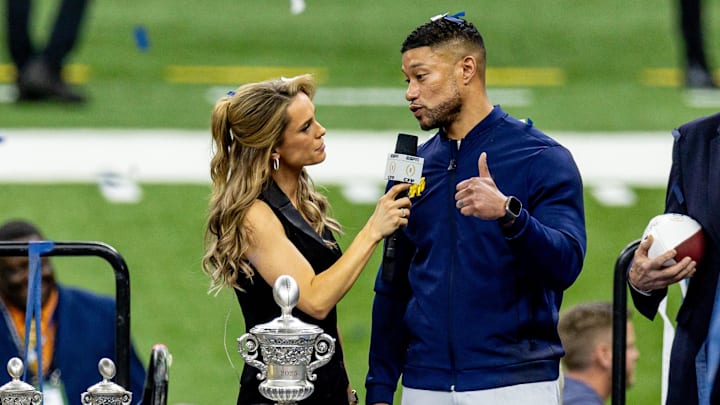 Jan 2, 2025; New Orleans, LA, USA;  Notre Dame Fighting Irish head coach Marcus Freeman is announced to fans after defeating the Georgia Bulldogs after the game at Caesars Superdome. Mandatory Credit: Stephen Lew-Imagn Images