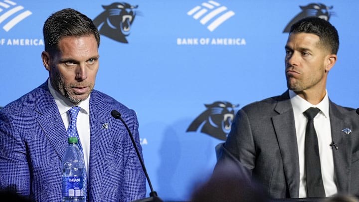 Feb 1, 2024; Charlotte, NC, USA; Carolina Panthers general manager Dan Morgan (left) speaks with new coach Dave Canales during the introductory press conference at Bank of America Stadium. Mandatory Credit: Jim Dedmon-Imagn Images Feb 1, 2024; Charlotte, NC, USA; Carolina Panthers general manager Dan Morgan (left) speaks with new coach Dave Canales during the introductory press conference at Bank of America Stadium. Mandatory Credit: Jim Dedmon-Imagn Images