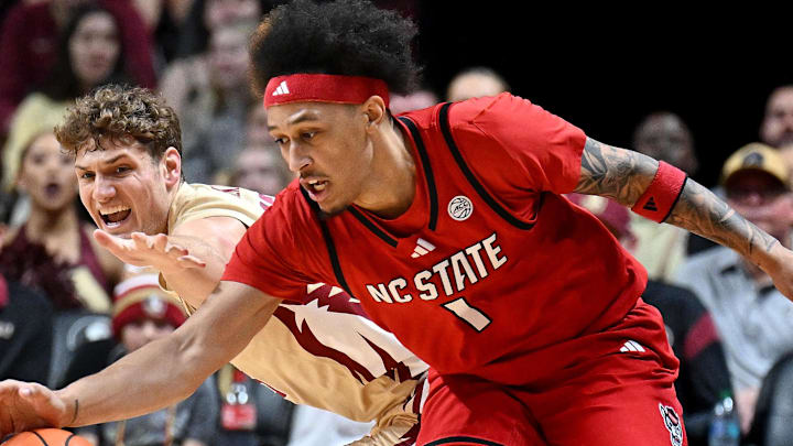 Jan 10, 2026; Tallahassee, Florida, USA; Florida State Seminoles forward Alex Steen (25) dives for the ball against North Carolina State Wolfpack forward Darrion Williams (1) during the first half at Donald L. Tucker Center. Mandatory Credit: Melina Myers-Imagn Images Jan 10, 2026; Tallahassee, Florida, USA; Florida State Seminoles forward Alex Steen (25) dives for the ball against North Carolina State Wolfpack forward Darrion Williams (1) during the first half at Donald L. Tucker Center. Mandatory Credit: Melina Myers-Imagn Images