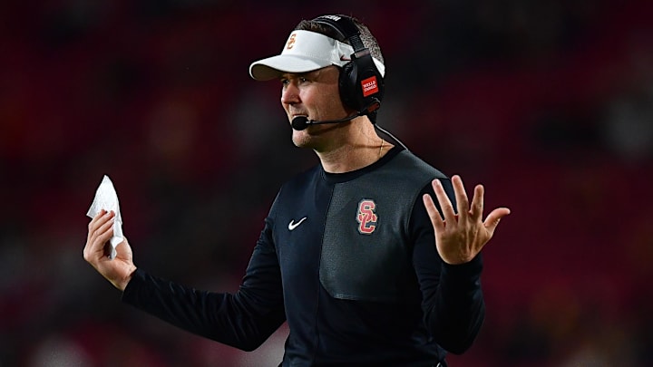 Sep 20, 2025; Los Angeles, California, USA; Southern California Trojans head coach Lincoln Riley watches game action against the Michigan State Spartans during the second half at the Los Angeles Memorial Coliseum. Mandatory Credit: Gary A. Vasquez-Imagn Images Sep 20, 2025; Los Angeles, California, USA; Southern California Trojans head coach Lincoln Riley watches game action against the Michigan State Spartans during the second half at the Los Angeles Memorial Coliseum. Mandatory Credit: Gary A. Vasquez-Imagn Images