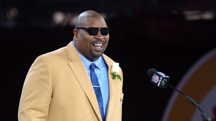 Aug 3, 2013; Canton, OH, USA; Larry Allen gives his induction speech at the 2013 Pro Football Hall of Fame Enshrinement at Fawcett Stadium. 