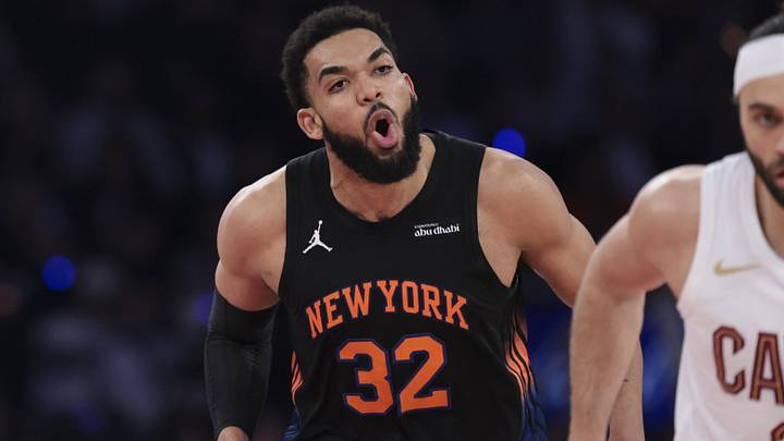 May 21, 2026; New York, New York, USA; New York Knicks center Karl-Anthony Towns (32) reacts as Cleveland Cavaliers guard Max Strus (2) runs up the court during the second quarter of game two of the eastern conference finals of the 2026 NBA playoffs at Madison Square Garden. Mandatory Credit: Vincent Carchietta-Imagn Images