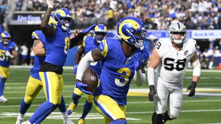 Oct 20, 2024; Inglewood, California, USA; Los Angeles Rams safety Kamren Curl (3) picks up a fumble by Las Vegas Raiders quarterback Gardner Minshew (not pictured)  in the second quarter at SoFi Stadium and runs it back for a touchdown. Mandatory Credit: Robert Hanashiro-Imagn Images