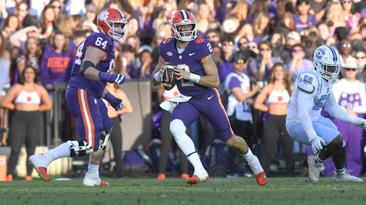 Nov 23, 2024; Clemson, South Carolina, USA; Clemson Tigers quarterback Cade Klubnik (2) runs for a first down against The Citadel Bulldogs during the second quarter at Memorial Stadium. 