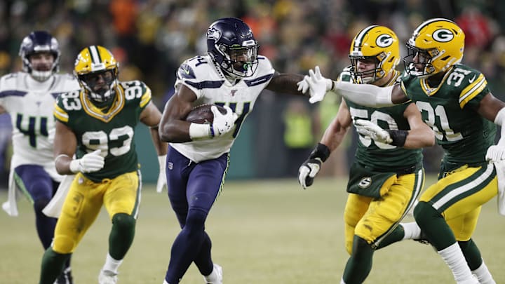 Seattle Seahawks wide receiver D.K. Metcalf runs through the Green Bay Packers' secondary during the 2019 playoffs.