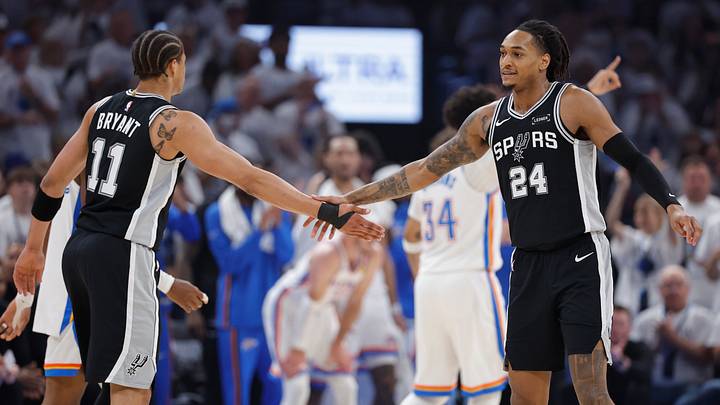 May 26, 2026; Oklahoma City, Oklahoma, USA; San Antonio Spurs guard Devin Vassell (24) celebrates with forward Carter Bryant (11) after a play during the first quarter against the Oklahoma City Thunder in Game 5 of the Western Conference Finals in the 2026 NBA Playoffs at Paycom Center. May 26, 2026; Oklahoma City, Oklahoma, USA; San Antonio Spurs guard Devin Vassell (24) celebrates with forward Carter Bryant (11) after a play during the first quarter against the Oklahoma City Thunder in Game 5 of the Western Conference Finals in the 2026 NBA Playoffs at Paycom Center.