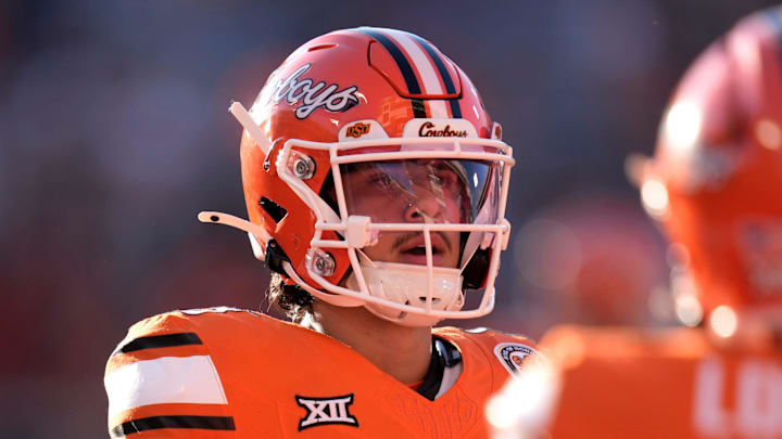 Oklahoma State Cowboys quarterback Garret Rangel (13) walks to the end zone after throwing a touchdown during a college football game between the Oklahoma State Cowboys (OSU) and the West Virginia Mountaineers at Boone Pickens Stadium in Stillwater, Okla., Saturday, Oct. 5, 2024.