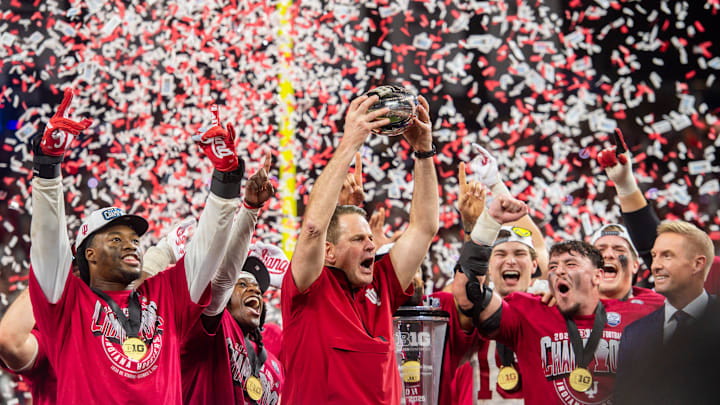 Indiana Head Coach Curt Cignetti and the Hoosiers celebrate after the Indiana versus Ohio State Big Ten Championship football game at Lucas Oil Stadium on Saturday, Dec. 6, 2025.
