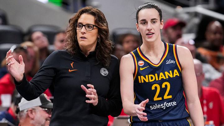 Indiana Fever head coach Stephanie White talks with Indiana Fever guard Caitlin Clark (22) Indiana Fever head coach Stephanie White talks with Indiana Fever guard Caitlin Clark (22)
