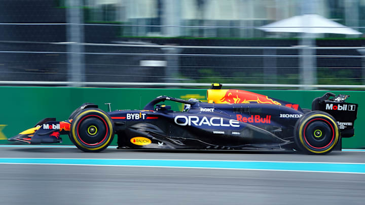 May 3, 2024; Miami Gardens, Florida, USA; Red Bull Racing driver Sergio Perez (11) enters the track during F1 practice at Miami International Autodrome. Mandatory Credit: John David Mercer-Imagn Images 