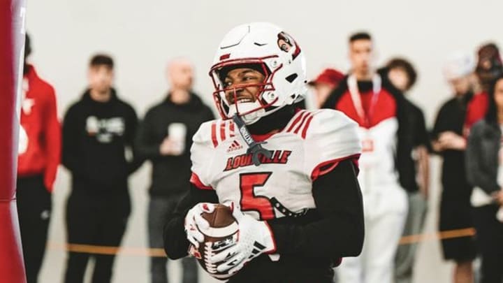 Louisville wide receiver Caullin Lacy runs drills during spring practice.