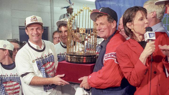 Former Braves manager Bobby Cox (center) celebrates winning the 1995 World Series.