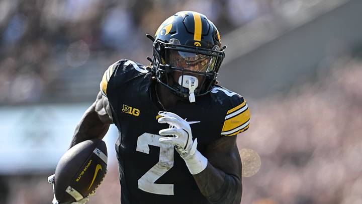 Oct 12, 2024; Iowa City, Iowa, USA; Iowa Hawkeyes running back Kaleb Johnson (2) runs for a 17 yard touchdown run during the second quarter against the Washington Huskies at Kinnick Stadium. Mandatory Credit: Jeffrey Becker-Imagn Images Oct 12, 2024; Iowa City, Iowa, USA; Iowa Hawkeyes running back Kaleb Johnson (2) runs for a 17 yard touchdown run during the second quarter against the Washington Huskies at Kinnick Stadium. Mandatory Credit: Jeffrey Becker-Imagn Images
