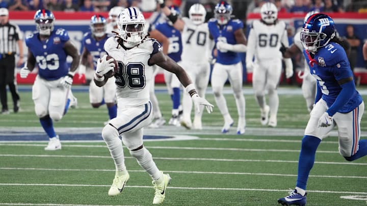 Dallas Cowboys WR CeeDee Lamb runs the ball for a touchdown against the Giants in the first half at MetLife Stadium. Dallas Cowboys WR CeeDee Lamb runs the ball for a touchdown against the Giants in the first half at MetLife Stadium.
