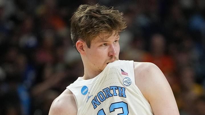 Mar 19, 2026; Greenville, SC, USA; North Carolina Tar Heels center Henri Veesaar (13) bites his jersey against the VCU Rams in the second half of a first round game of the men's 2026 NCAA Tournament at Bon Secours Wellness Arena. Mandatory Credit: Bob Donnan-Imagn Images