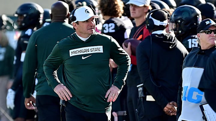 Nov 2, 2024; East Lansing, Michigan, USA;  Michigan State Spartans head coach Jonathan Smith looks over his sidelines during the first quarter against the Indiana Hoosiers at Spartan Stadium. Mandatory Credit: Dale Young-Imagn Images