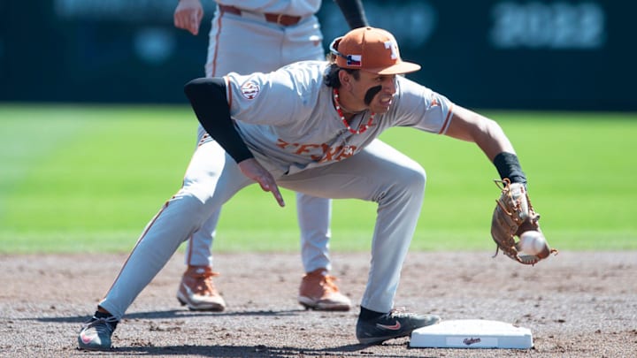 Texas Longhorns' Adrian Rodriguez fields a ground ball. 