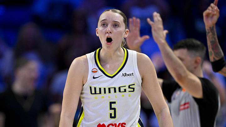 Jun 20, 2026; Arlington, Texas, USA; Dallas Wings guard Paige Bueckers (5) celebrates after she is fouled on a basket during the fourth quarter against the Chicago Sky at College Park Center. Mandatory Credit: Jerome Miron-Imagn Images