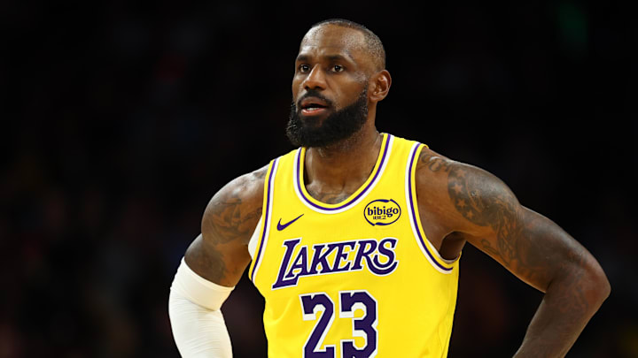 Dec 23, 2025; Phoenix, Arizona, USA; Los Angeles Lakers forward LeBron James (23) against the Phoenix Suns at Mortgage Matchup Center. Mandatory Credit: Mark J. Rebilas-Imagn Images