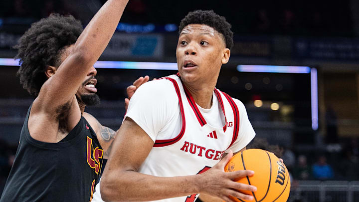 Mar 12, 2025; Indianapolis, IN, USA; Rutgers Scarlet Knights guard Ace Bailey (4) shoots the ball while USC Trojans guard Kevin Patton Jr. (8) defends in the second half at Gainbridge Fieldhouse. Mandatory Credit: Trevor Ruszkowski-Imagn Images Mar 12, 2025; Indianapolis, IN, USA; Rutgers Scarlet Knights guard Ace Bailey (4) shoots the ball while USC Trojans guard Kevin Patton Jr. (8) defends in the second half at Gainbridge Fieldhouse. Mandatory Credit: Trevor Ruszkowski-Imagn Images