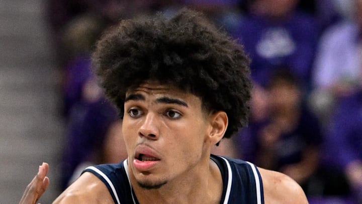 Jan 10, 2026; Fort Worth, Texas, USA; Arizona Wildcats forward Koa Peat (10) brings the ball up court during the game between the Horned Frogs and the Wildcats at Ed and Rae Schollmaier Arena. Mandatory Credit: Jerome Miron-Imagn Images
