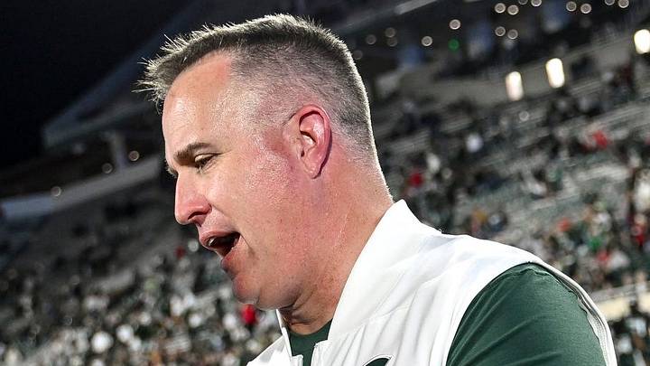 Michigan State’s head coach Pat Fitzgerald, right, shakes hands with Nebraska head coach Matt Rhule after the game on Saturday, Sept. 26, 2026, in East Lansing. Michigan State’s head coach Pat Fitzgerald, right, shakes hands with Nebraska head coach Matt Rhule after the game on Saturday, Sept. 26, 2026, in East Lansing.