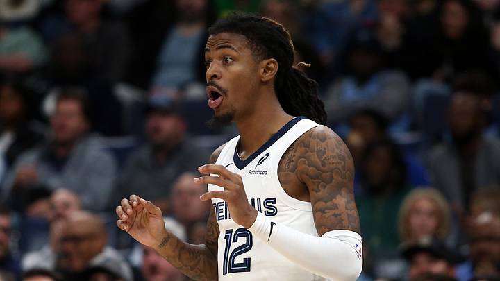 Nov 5, 2025; Memphis, Tennessee, USA; Memphis Grizzlies guard Ja Morant (12) reacts during the third quarter against the Houston Rockets at FedExForum. Mandatory Credit: Petre Thomas-Imagn Images