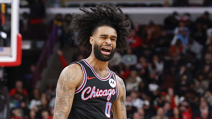 Jan 24, 2026; Chicago, Illinois, USA; Chicago Bulls guard Coby White (0) reacts after scoring against the Boston Celtics during the first half at United Center. Mandatory Credit: Kamil Krzaczynski-Imagn Images
