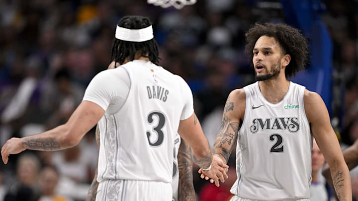 Apr 9, 2025; Dallas, Texas, USA; Dallas Mavericks forward Anthony Davis (3) and center Dereck Lively II (2) in action during the game between the Dallas Mavericks and the Los Angeles Lakers at American Airlines Center. Mandatory Credit: Jerome Miron-Imagn Images