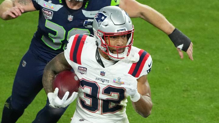 Feb 8, 2026; Santa Clara, CA, USA; New England Patriots running back Treveyon Henderson (32) runs the ball past Seattle Seahawks fullback Brady Russell (38) in the second half in Super Bowl LX at Levi's Stadium. Mandatory Credit: Kirby Lee-Imagn Images Feb 8, 2026; Santa Clara, CA, USA; New England Patriots running back Treveyon Henderson (32) runs the ball past Seattle Seahawks fullback Brady Russell (38) in the second half in Super Bowl LX at Levi's Stadium. Mandatory Credit: Kirby Lee-Imagn Images