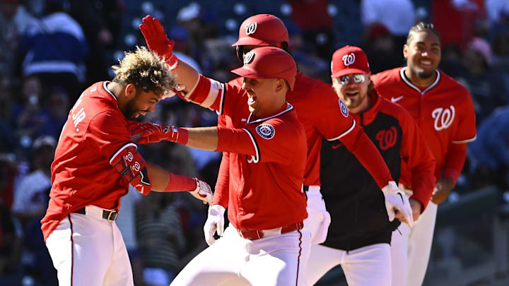 Apr 27, 2025; Washington, District of Columbia, USA; Washington Nationals second baseman Luis Garcia Jr. (2) is congratulated by teammates after the game against the New York Mets at Nationals Park Apr 27, 2025; Washington, District of Columbia, USA; Washington Nationals second baseman Luis Garcia Jr. (2) is congratulated by teammates after the game against the New York Mets at Nationals Park