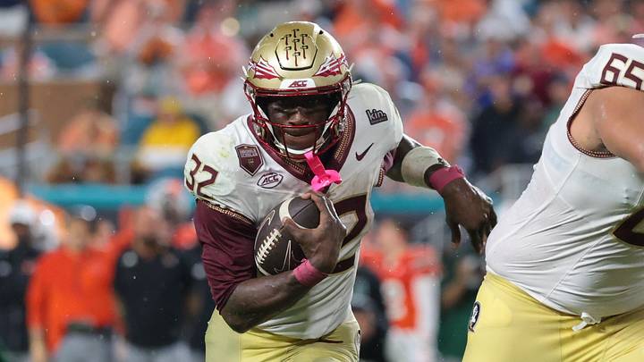 Oct 17, 2026; Miami Gardens, Florida, USA; Florida State Seminoles running back Ousmane Kromah (32) runs during the second quarter against the Miami Hurricanes at Hard Rock Stadium. Mandatory Credit: Sam Navarro-Imagn Images Oct 17, 2026; Miami Gardens, Florida, USA; Florida State Seminoles running back Ousmane Kromah (32) runs during the second quarter against the Miami Hurricanes at Hard Rock Stadium. Mandatory Credit: Sam Navarro-Imagn Images