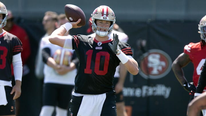 Jun 10, 2025; Santa Clara, CA, USA; San Francisco 49ers quarterback Mac Jones (10) participates in a passing drill during an OTA at Levi's Stadium. Mandatory Credit: D. Ross Cameron-Imagn Images