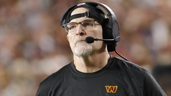 Dec 29, 2024; Landover, Maryland, USA; Washington Commanders head coach Dan Quinn looks on from the sidelines against the Atlanta Falcons during the second half at Northwest Stadium. Mandatory Credit: Amber Searls-Imagn Images