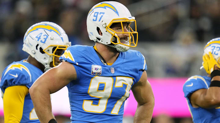 Oct 4, 2021; Inglewood, California, USA; Los Angeles Chargers defensive end Joey Bosa (97) waits at the line with cornerback Michael Davis (43) and safety Alohi Gilman (32) during the first half against the Las Vegas Raiders at SoFi Stadium. Mandatory Credit: Robert Hanashiro-Imagn Images