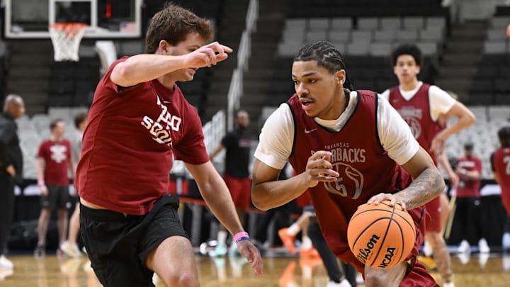 Arkansas Razorbacks guard Darius Acuff Jr. (5) dribbles the basketball during a practice session ahead of the west regional of the men's 2026 NCAA Tournament at SAP Center. Arkansas Razorbacks guard Darius Acuff Jr. (5) dribbles the basketball during a practice session ahead of the west regional of the men's 2026 NCAA Tournament at SAP Center.