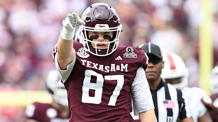 Dec 20, 2025; College Station, TX, USA; Texas A&M Aggies tight end Nate Boerkircher (87) celebrates a first down against the Miami Hurricanes during first quarter of the first round game of the CFP National Playoff at Kyle Field. Mandatory Credit: Maria Lysaker-Imagn Images Dec 20, 2025; College Station, TX, USA; Texas A&M Aggies tight end Nate Boerkircher (87) celebrates a first down against the Miami Hurricanes during first quarter of the first round game of the CFP National Playoff at Kyle Field. Mandatory Credit: Maria Lysaker-Imagn Images