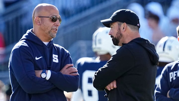 Penn State's James Franklin, left, talks to Ohio State's Ryan Day