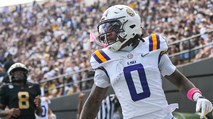 Oct 18, 2025; Nashville, Tennessee, USA;  Louisiana State Tigers wide receiver Zavion Thomas (0) celebrates with his teammates after scoring a touchdown against the Vanderbilt Commodores during the second half at FirstBank Stadium. Mandatory Credit: Steve Roberts-Imagn Images