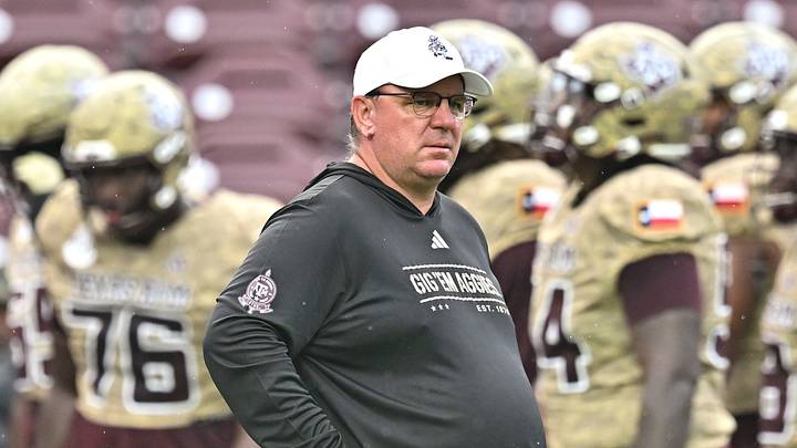 Texas A&M Aggies head coach Mike Elko looks on prior to the game against the Arkansas Razorbacks at Kyle Field. Texas A&M Aggies head coach Mike Elko looks on prior to the game against the Arkansas Razorbacks at Kyle Field.