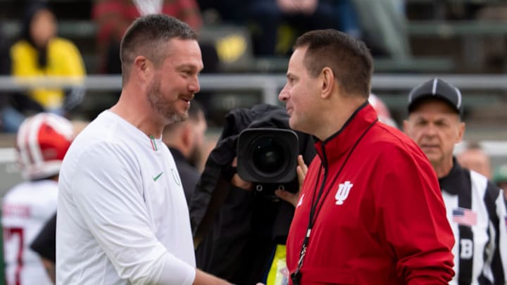 Oregon head coach Dan Lanning, left, shakes hands with Indiana head coach Curt Cignetti as the Oregon Ducks host the Indiana Hoosiers Oct. 11, 2025, at Autzen Stadium in Eugene, Oregon.