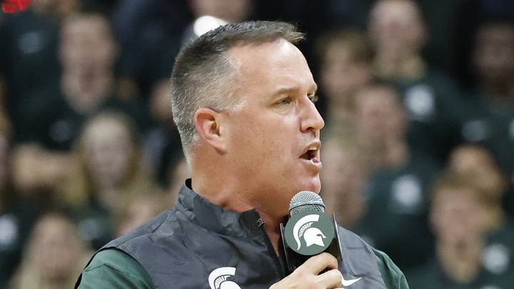Michigan State Spartans head football coach Pat Fitzgerald introduces himself to the crowd at a men's basketball game against the Iowa Hawkeyes at the Breslin Center on Tuesday, Dec. 2, 2025. Michigan State Spartans head football coach Pat Fitzgerald introduces himself to the crowd at a men's basketball game against the Iowa Hawkeyes at the Breslin Center on Tuesday, Dec. 2, 2025.