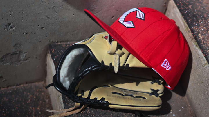 Apr 11, 2026; Cincinnati, Ohio, USA;  A view of an official Cincinnati Reds hat on the dugout steps during the game against the Los Angeles Angels at Great American Ball Park. Mandatory Credit: Aaron Doster-Imagn Images