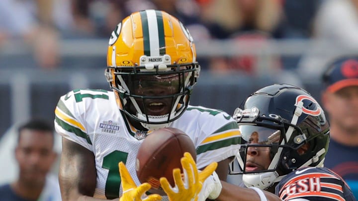 Chicago Bears cornerback Kyler Gordon (6) knocks the ball away from Green Bay Packers receiver Jayden Reed in 2023.