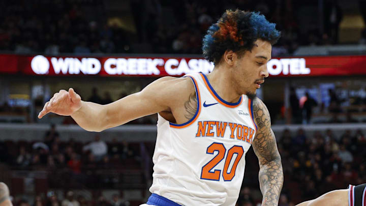 Feb 22, 2026; Chicago, Illinois, USA; New York Knicks forward Jeremy Sochan (20) defends against Chicago Bulls guard Tre Jones (30) during the first half at United Center. Mandatory Credit: Kamil Krzaczynski-Imagn Images